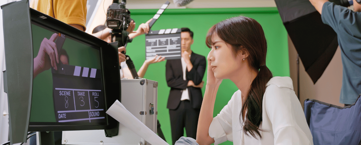 asian woman directing movie and shooting film