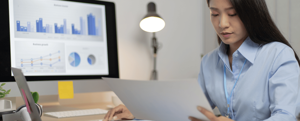 asian woman working on laptop