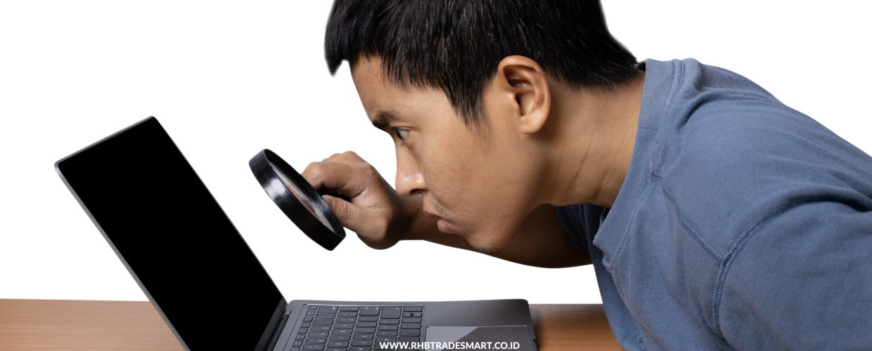 asian-man-looking-with-magnifyer-glass
